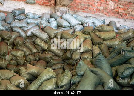 Mountains of sack goods piled up in the chemical warehouse Stock Photo