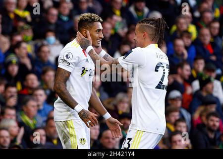 Norwich, UK. 31st Oct, 2021. Raphinha of Leeds United (L) celebrates getting the first goal of the game with Kalvin Phillips of Leeds United during the Premier League match between Norwich City and Leeds United at Carrow Road on October 31st 2021 in Norwich, England. (Photo by Mick Kearns/phcimages.com) Credit: PHC Images/Alamy Live News Stock Photo
