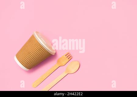 Reusable tableware with eco coffee cup, spoon and fork. Concept of eco friendly supplies. Flat lay style. Stock Photo