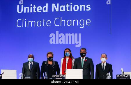 President of the United Nations General Assembly Abdulla Shahid, Executive Secretary of the UN Framework Convention on Climate Change Patricia Espinosa, the environment minister of Chile Carolina Schmidt, COP26 President Alok Sharma, and the Chairperson of the Intergovernmental Panel on Climate Change Hoesung Lee (From L to R) stand on stage during the opening ceremony for COP26 in Glasgow, Scotland, the United Kingdom, on Oct. 31, 2021. The 26th United Nations Conference of Parties on Climate Change (COP26), delayed by a year due to the COVID-19 Stock Photo