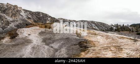 Scenic lifeless calcium terraces at Mammoth Hot Springs, Yellowstone National Park, USA Stock Photo