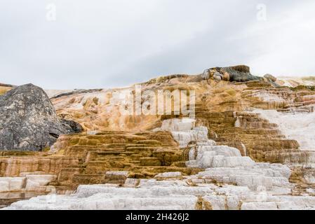 Scenic lifeless calcium terraces at Mammoth Hot Springs, Yellowstone National Park, USA Stock Photo