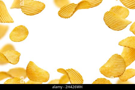 Frame of ridged potato chips isolated on white background Stock Photo