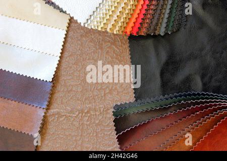 Samples of colorful upholstery fabrics. Various texture and colors. Stock Photo