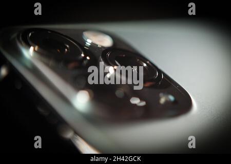 The read camera module is seen in an iPhone 11 Pro Max in this photo illustration in Warsaw, Poland on 31 October, 2021. Stock Photo