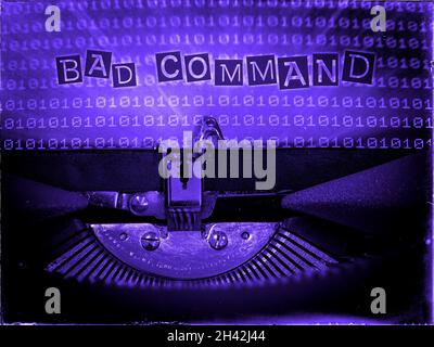 BAD COMMAND, Mechanical Typewriter, Binary code background, Blue tone, Vintage distorted look, Ransom note typography Stock Photo