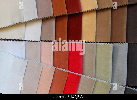 Samles organic fabrics:linen,cotton,satin.Natural texture background. Fabric samples. Different colors and textures, natural and synthetic Stock Photo