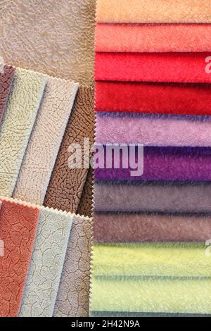 Samles organic fabrics:linen,cotton,satin.Natural texture background. Fabric samples. Different colors and textures, natural and synthetic Stock Photo