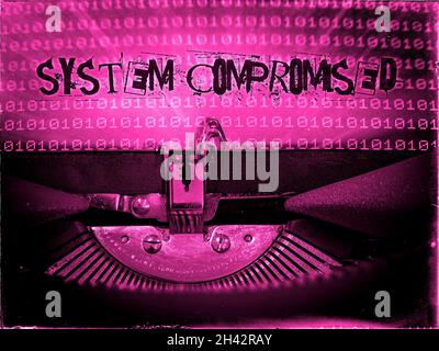 System compromised displayed on a mechanical vintage Typewriter Stock Photo