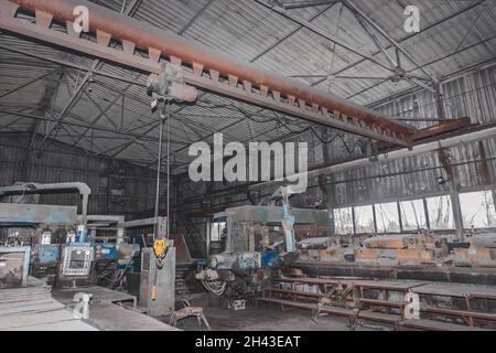 General plan of the industrial workshop of the plant production with old machines and equipment for metalworking factory manufacturing. Stock Photo