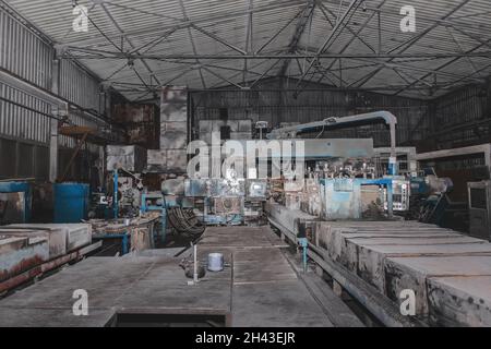 General plan of the industrial workshop of the plant production with old machines and equipment for metalworking factory manufacturing. Stock Photo