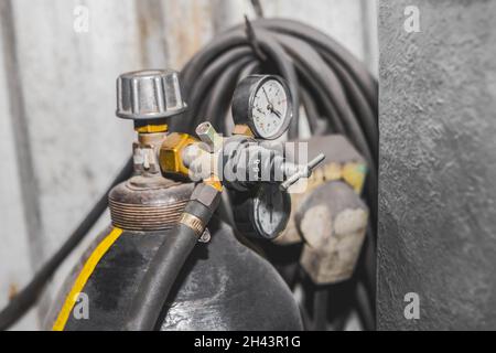 Carbon dioxide cylinder with pressure regulator reducer gas industry welding equipment. Stock Photo