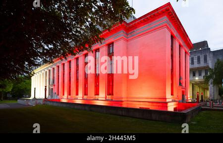 CARDIFF, WALES - MAY 28: The Welsh Government Building at Cathays Park lit up red in support of Wales in the Euros on May 28, 2021 in Cardiff, Wales. Stock Photo