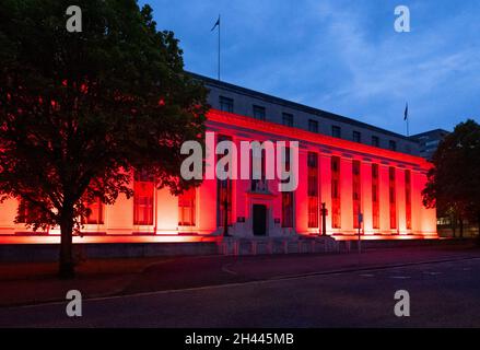 CARDIFF, WALES - MAY 28: The Welsh Government Building at Cathays Park lit up red in support of Wales in the Euros on May 28, 2021 in Cardiff, Wales. Stock Photo