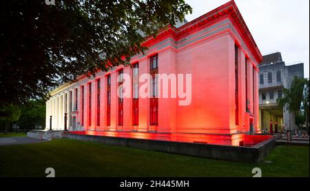 CARDIFF, WALES - MAY 28: The Welsh Government Building at Cathays Park lit up red in support of Wales in the Euros on May 28, 2021 in Cardiff, Wales. Stock Photo