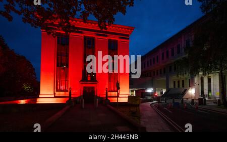 CARDIFF, WALES - MAY 28: The Welsh Government Building at Cathays Park lit up red in support of Wales in the Euros on May 28, 2021 in Cardiff, Wales. Stock Photo