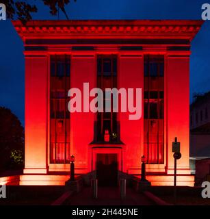 CARDIFF, WALES - MAY 28: The Welsh Government Building at Cathays Park lit up red in support of Wales in the Euros on May 28, 2021 in Cardiff, Wales. Stock Photo