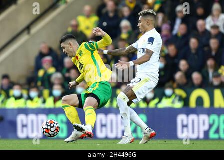 Norwich, UK. 31st Oct, 2021. Raphinha #10 of Leeds United tackles Milot Rashica #17 of Norwich City in Norwich, United Kingdom on 10/31/2021. (Photo by Arron Gent/News Images/Sipa USA) Credit: Sipa USA/Alamy Live News Stock Photo