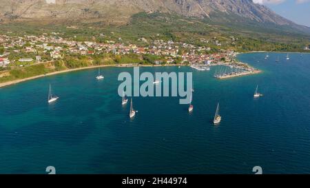 Aerial photo of moored sailing boat at Vathiavali port town in West Greece Stock Photo