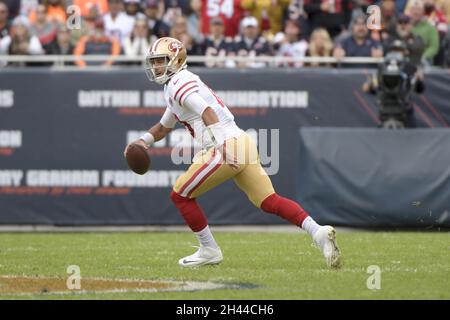 Chicago, United States. 31st Oct, 2021. San Francisco 49ers quarterback Jimmy Garoppolo scrambles as his looks for an open receiver in the first quarter against the Chicago Bears at Soldier Field in Chicago on Sunday, October 31, 2021. Photo by Mark Black/UPI Credit: UPI/Alamy Live News Stock Photo