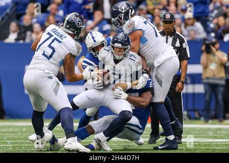 Indianapolis, Indiana, USA. 31st Oct, 2021. Tennessee Titans quarterback Ryan Tannehill (17) is sacked by Indianapolis Colts outside linebacker Darius Leonard (53) in the game between the Tennessee Titans and the Indianapolis Colts at Lucas Oil Stadium, Indianapolis, Indiana. (Credit Image: © Scott Stuart/ZUMA Press Wire) Stock Photo