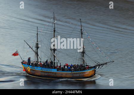 Replica of Bark Endeavour giving pleasure trips around Whitby Bay,North Yorkshire,UK Stock Photo