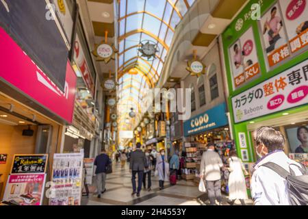 Nakano Sun Shopping Street is one of the famous shopping streets in Tokyo. Thousands of tourists visit it every day. It's very close to Nakano Station. Stock Photo