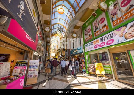 Nakano Sun Shopping Street is one of the famous shopping streets in Tokyo. Thousands of tourists visit it every day. It's very close to Nakano Station. Stock Photo