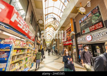 Nakano Sun Shopping Street is one of the famous shopping streets in Tokyo. Thousands of tourists visit it every day. It's very close to Nakano Station. Stock Photo