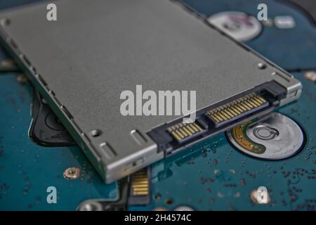 Silver top Hard drive stacked on another hard drive background texture Stock Photo