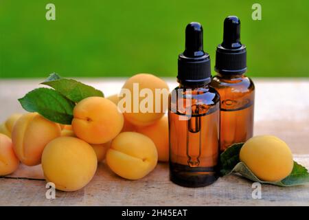 Apricot kernel oil. Organic natural oil. Apricot oil in a bottle with a pipette . natural Apricot oil