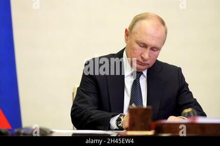 Novo-Ogaryovo, Russia. 31st Oct, 2021. Russian President Vladimir Putin, attends the second day of the G20 Summit leadership meeting via video conference from the Novo-Ogaryovo official residence October 31, 2021 in Moscow, Russia. Credit: Evgeniy Paulin/Kremlin Pool/Alamy Live News Stock Photo