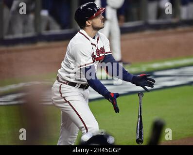 Atlanta Braves' Adam Duvall watches his two-run single during the ninth ...