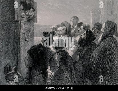 A crowd of people have gathered around a stand in the street to watch a Punch and Judy show. Engraving by J. Goodyear after T. Uwins. Stock Photo