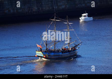 Replica of Bark Endeavour giving pleasure trips around Whitby Bay,North Yorkshire,UK Stock Photo