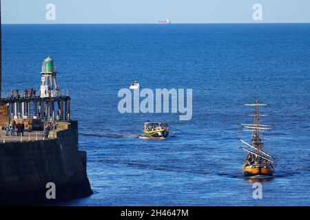 Replica of Bark Endeavour giving pleasure trips around Whitby Bay,North Yorkshire,UK Stock Photo