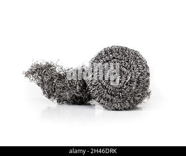 Two steel wool scrubbers. New and used stainless steel wool scouring pads. Used to clean heavy duty dirt,  kitchen crease and oil. Isolated on white. Stock Photo