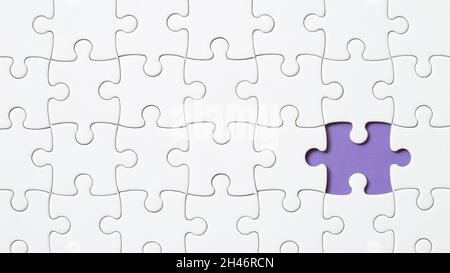 Set of white puzzle pieces and last one piece Stock Photo