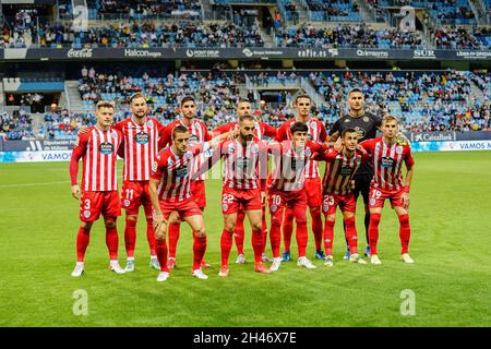 Malaga, Spain. 23rd Oct, 2021. CD Lugo players pose for group photo during the LaLiga SmartBank 2021/22 match between Malaga CF and CD Lugo at La Rosaleda Stadium. Final Score; Malaga CF 1:0 CD Lugo. (Photo by Francis Gonzalez/SOPA Images/Sipa USA) Credit: Sipa USA/Alamy Live News Stock Photo