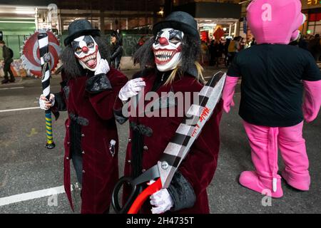 Clown costume at the Greenwich Village Halloween Parade, New York City, USA  in the 1980's Photographed with Black & White film at night Stock Photo -  Alamy