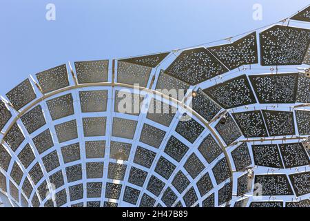 Dubai, UAE, 17.10.2021. Artificial tree tower constructions at Expo 2020 site in Mobility District, metal tree against blue sky. Stock Photo