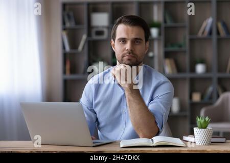 Portrait of confident young successful businessman. Stock Photo