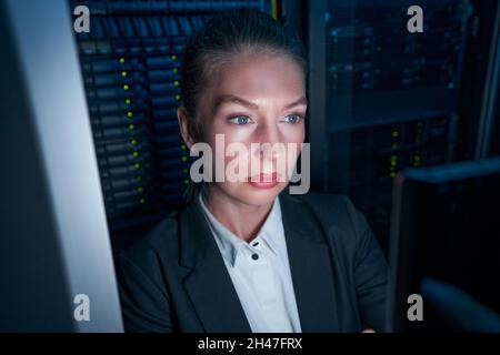 System administrator working on cyber security in data center Stock Photo