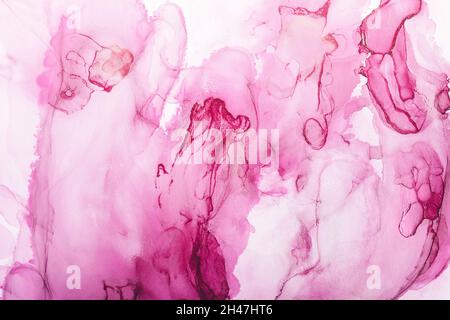 Watercolor alcohol ink swirls. Transparent waves and swirls in magenta colors. Delicate pastel spots Stock Photo