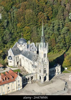 AERIAL VIEW. Basilica of Bois Chenu, built on the site where Joan of Arc heard voices. Domrémy-la-Pucelle, Vosges, Grand Est, France. Stock Photo