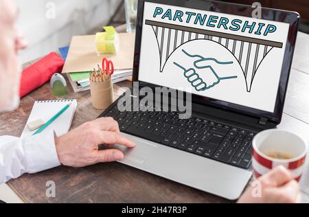 Partnership concept shown on a laptop screen Stock Photo