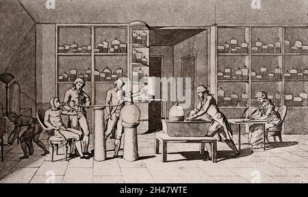 Lavoisier in his laboratory conducting an experiment on the respiration of a man resting. Photogravure after M.A.P. Lavoisier. Stock Photo