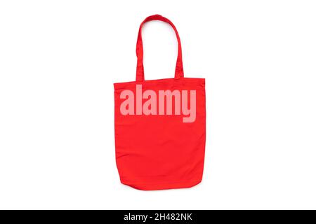 Red blank clean canvas bag mockup, isolated on white, shopping bag, side view Stock Photo