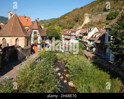 AERIAL VIEW from a 6-meter mast. Picturesque town at the eastern foothills of the Vosges Mountains. Kaysersberg-Vignoble, Alsace, Grand Est, France. Stock Photo
