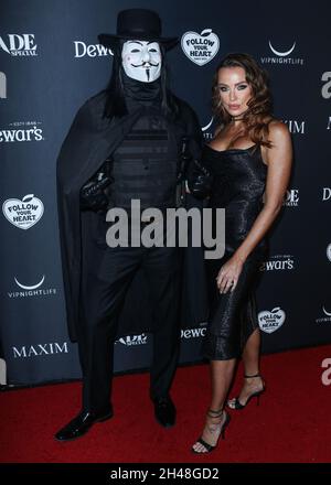 West Hollywood, United States. 31st Oct, 2021. WEST HOLLYWOOD, LOS ANGELES, CALIFORNIA, USA - OCTOBER 31: American mixed martial artist and politician Tito Ortiz and girlfriend/actress Amber Nichole Miller arrive at the 2021 Maxim Halloween Party Produced by MADE Special held at Hyde Sunset Kitchen   Cocktails on October 31, 2021 in West Hollywood, Los Angeles, California, United States. (Photo by Xavier Collin/Image Press Agency/Sipa USA) Credit: Sipa USA/Alamy Live News Stock Photo